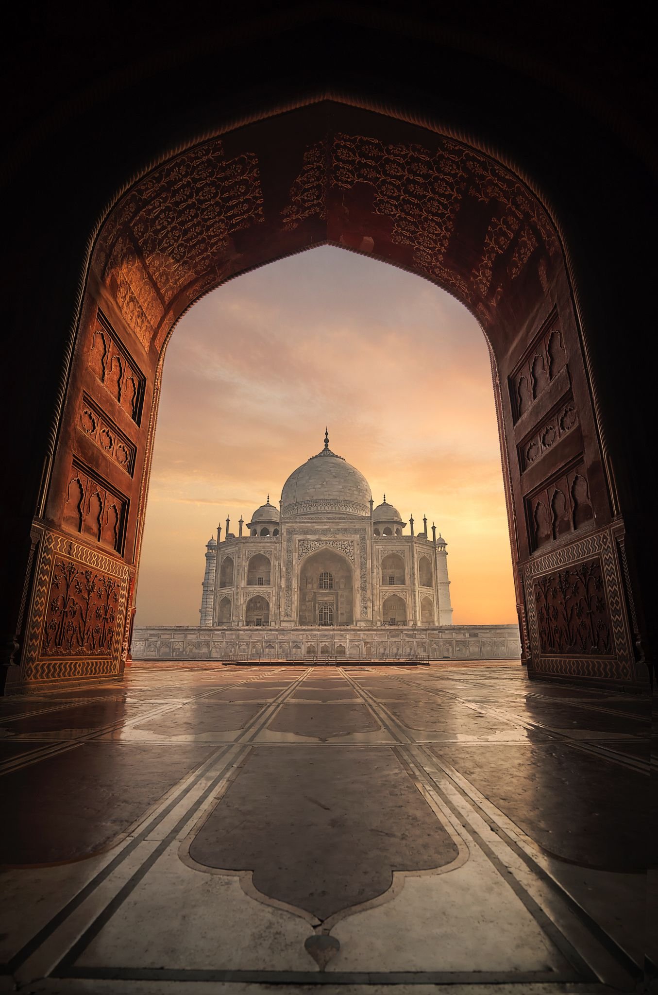 The Taj Mahal seen through an arch in Agra