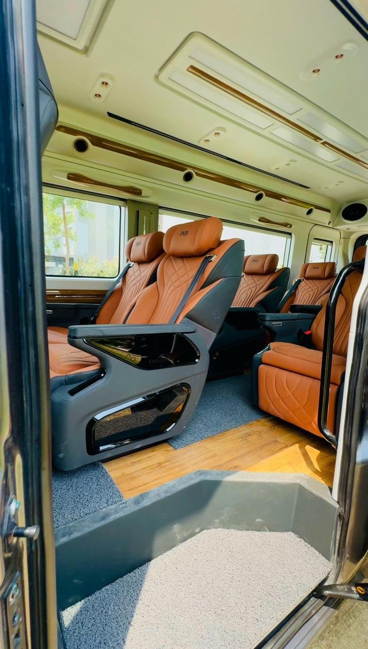 Tan reclining seats viewed from the passenger entrance