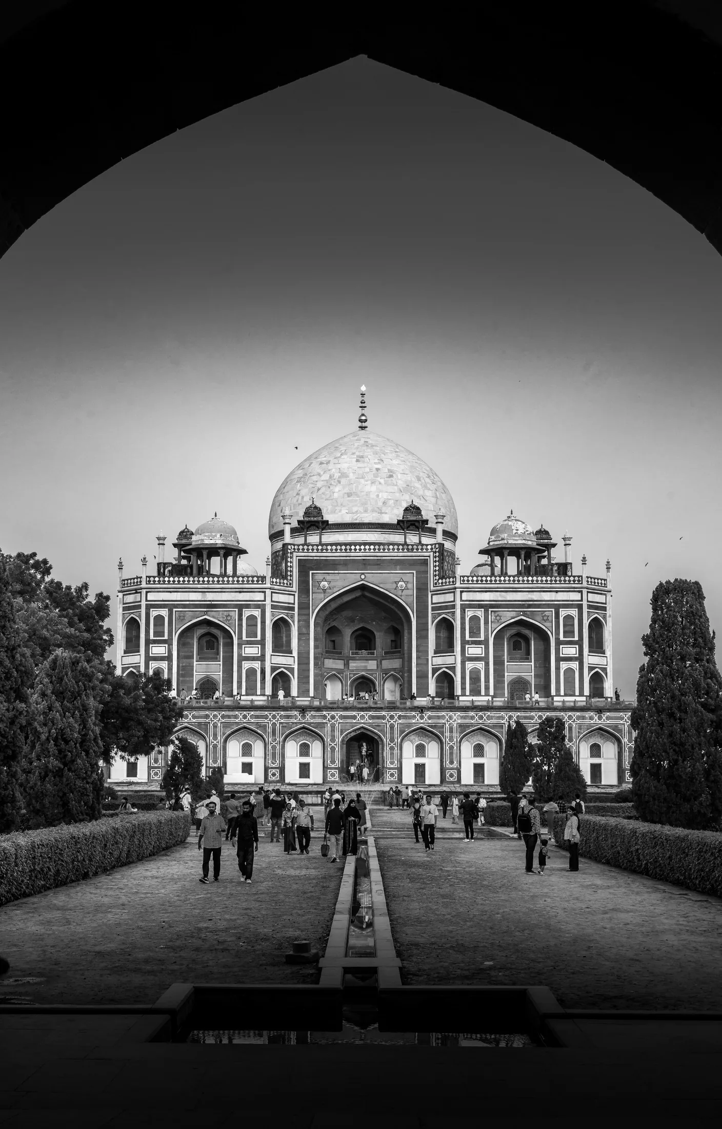 Visitors approaching Humayun's Tomb through its formal garden