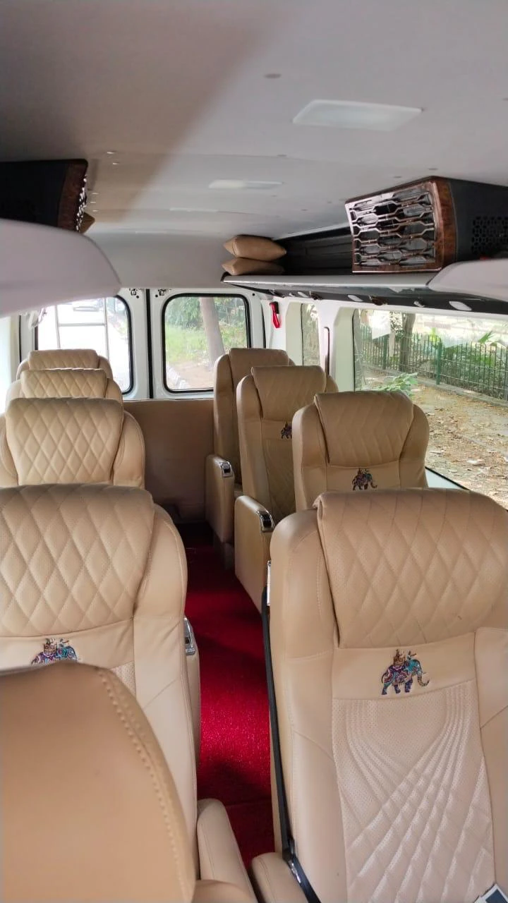 Tan multi-row seating inside an Urbania traveller
