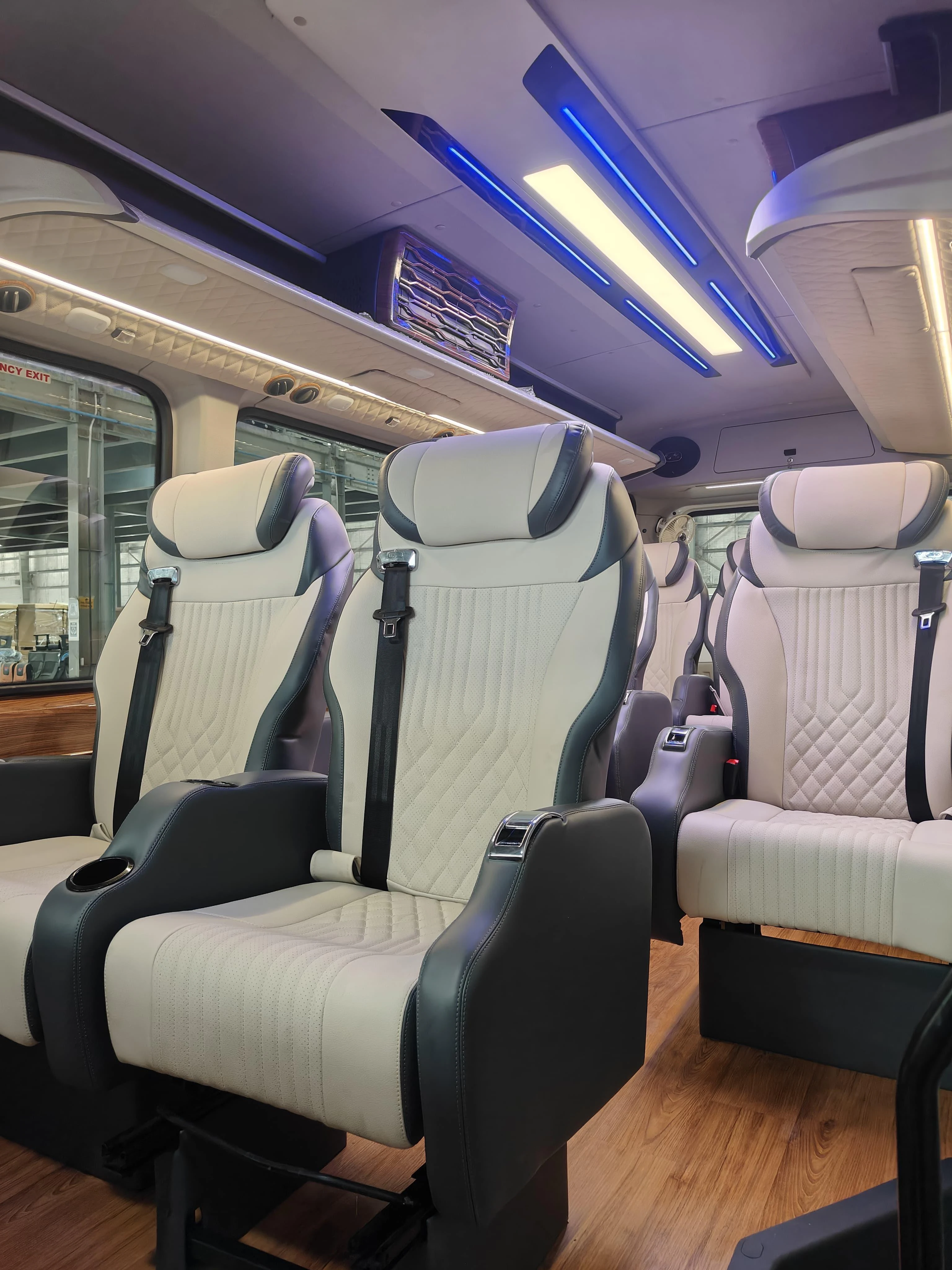 Luxury Urbania cabin with individual executive seats and ambient lighting