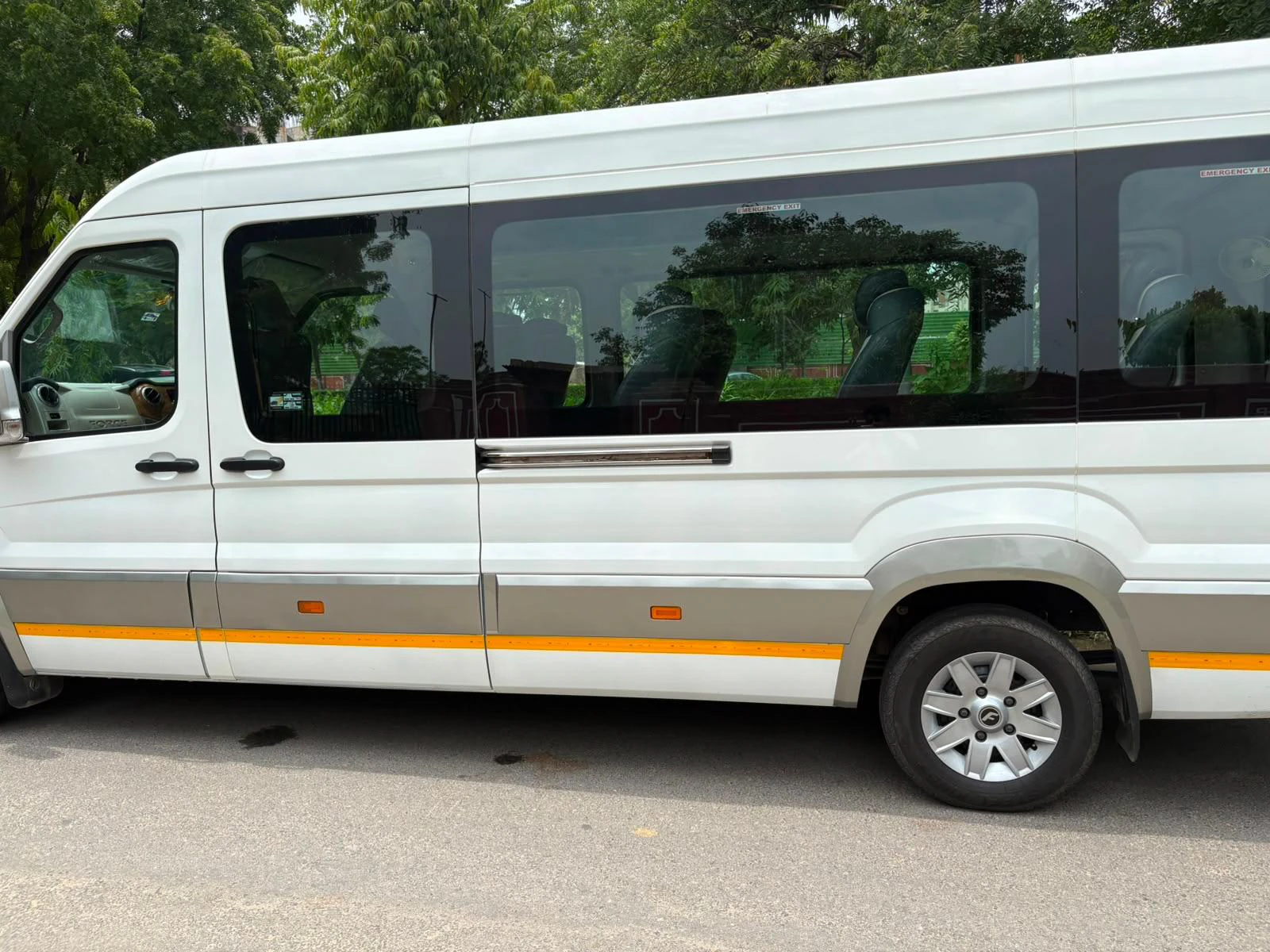 White Urbania in full side profile on the road