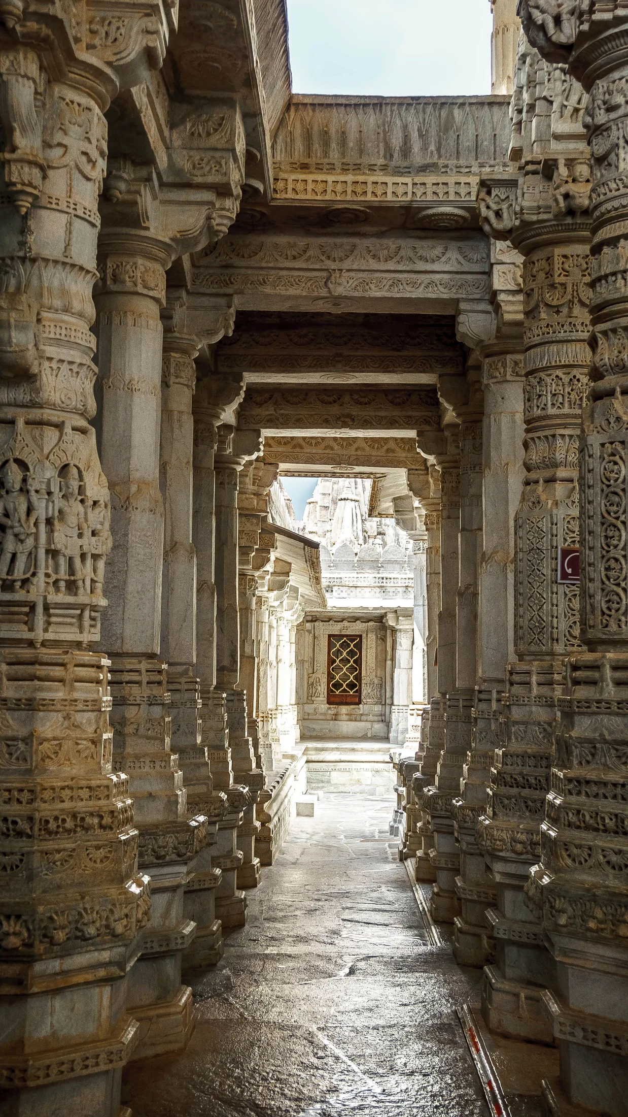 Intricate stone passage inside Ranakpur Jain Temple